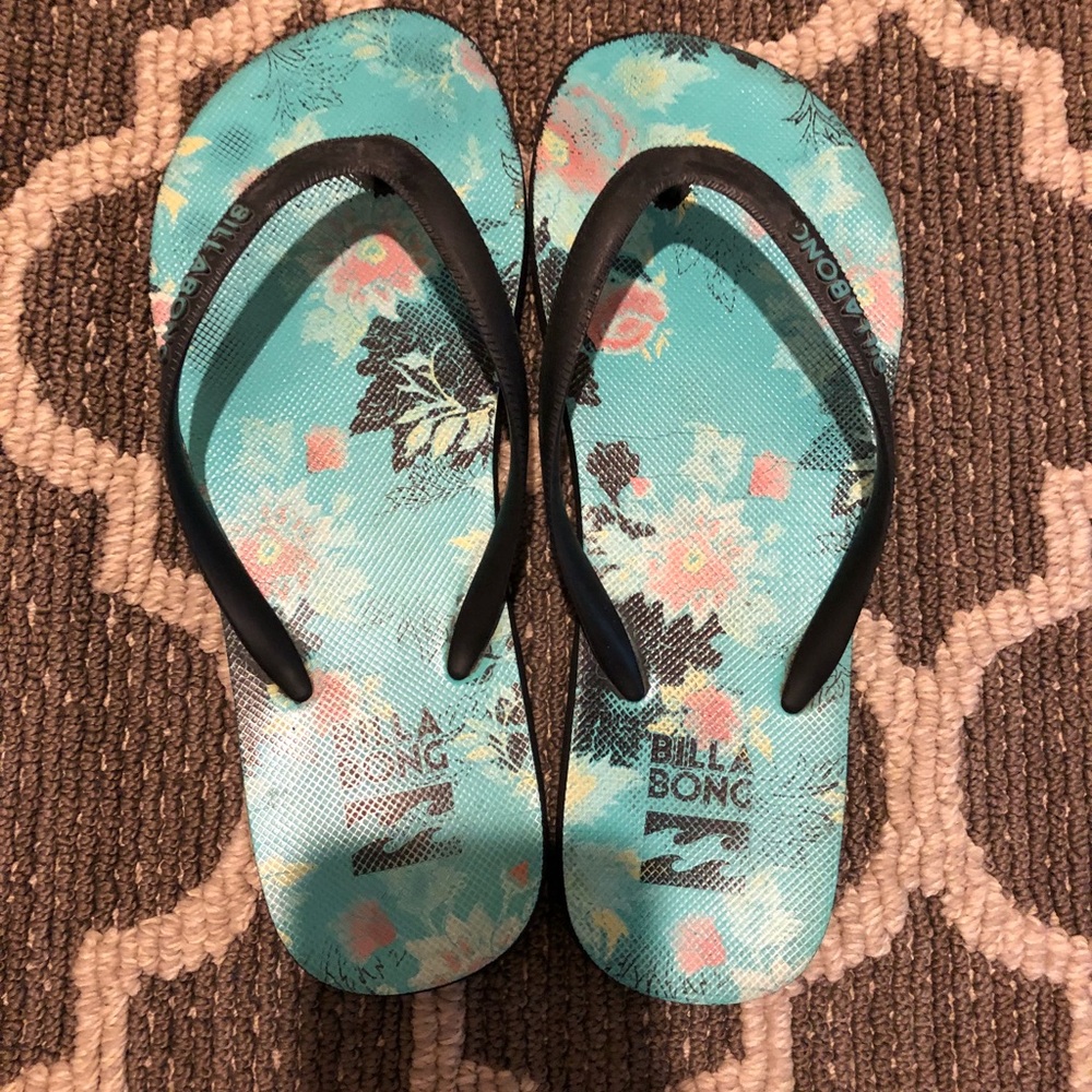 Women’s blue and black flip flops